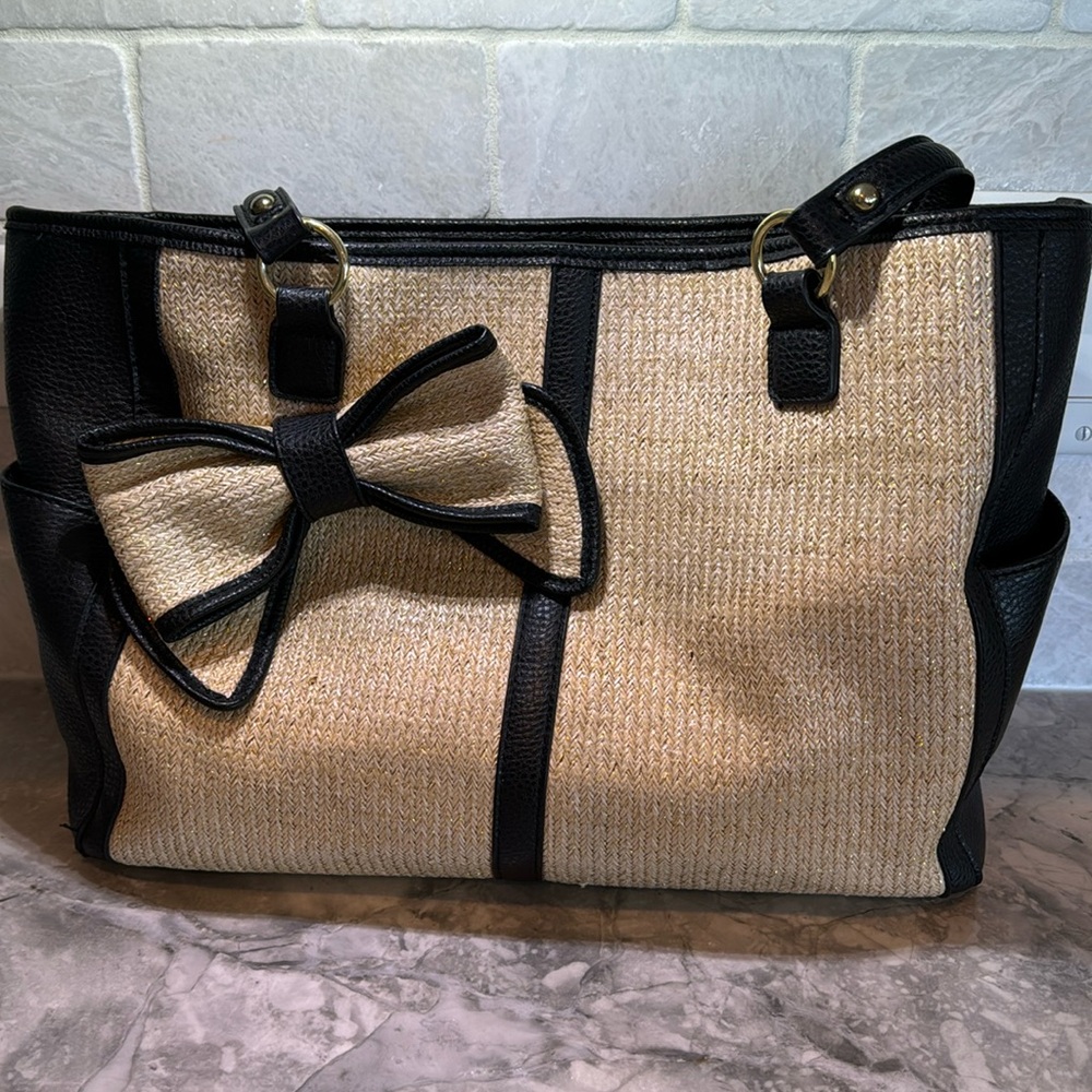 Jessica Simpson shoulder bag. Trendy Black and tan with large Bow.
